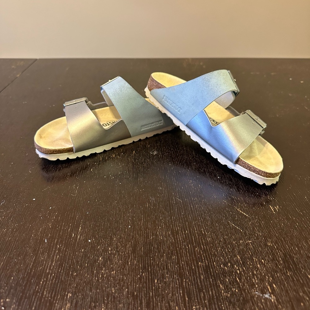 Birkenstock size EU 37. Lightly worn. Silver and light blue two tone.